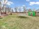 Fenced backyard with a shed and large trampoline, plenty of space for outdoor activities at 504 Pelenor Dr, Franklin, IN 46131