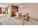 Inviting dining room with a stylish table, seating for four, and abundant natural light at 504 Pelenor Dr, Franklin, IN 46131