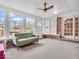 Charming sunroom filled with natural light, comfortable seating, and views of the backyard at 504 Pelenor Dr, Franklin, IN 46131