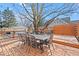 Spacious backyard deck featuring a large dining table and outdoor seating area at 5055 Willow Rd, Zionsville, IN 46077