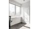 Bright office space with a large window and minimalist decor at 606 E 10Th St, Indianapolis, IN 46202
