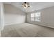 Spacious bedroom with vaulted ceilings, a ceiling fan and plush carpeting at 6311 Feather Run Dr, Indianapolis, IN 46237