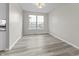 Bright dining space features hardwood floors and ample natural light at 6311 Feather Run Dr, Indianapolis, IN 46237