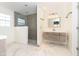 Modern bathroom with a glass-enclosed shower and sleek vanity at 6333 Silver Moon Ct, Indianapolis, IN 46259