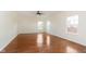 Spacious bedroom with hardwood floors and bright windows at 6333 Silver Moon Ct, Indianapolis, IN 46259
