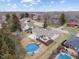 Aerial view of the home's backyard with pool and spacious patio area at 6412 Lava Ct, Indianapolis, IN 46237
