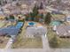 Aerial view of this property, nestled within a community of well-maintained lawns, mature trees and swimming pools at 6412 Lava Ct, Indianapolis, IN 46237