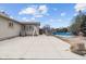 Wide backyard patio with an above ground pool and a well-maintained lawn at 6412 Lava Ct, Indianapolis, IN 46237