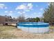 Above-ground pool with a deck, perfect for summer fun and relaxation in the backyard at 6412 Lava Ct, Indianapolis, IN 46237