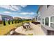 Enjoy outdoor living on this backyard patio, perfect for entertaining and relaxing with ample seating and nice landscaping at 6481 W Treeline Ln, McCordsville, IN 46055