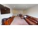 Basement seating and dining area with tv at 6481 W Treeline Ln, McCordsville, IN 46055
