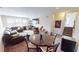 Finished basement includes a seating area, tv, and a round table at 6481 W Treeline Ln, McCordsville, IN 46055