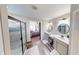 Bright bathroom featuring double sinks, a glass shower, and modern lighting fixtures for a spa-like experience at 6481 W Treeline Ln, McCordsville, IN 46055