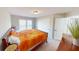 Bright bedroom featuring a large window, closet, and contemporary decor at 6481 W Treeline Ln, McCordsville, IN 46055
