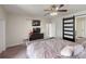 Bright bedroom boasts a comfortable bed, TV, and modern barn door at 6481 W Treeline Ln, McCordsville, IN 46055