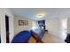 Cozy bedroom with sports decor, a comfortable bed, and natural light creating a relaxing atmosphere at 6481 W Treeline Ln, McCordsville, IN 46055