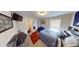 Cozy bedroom with sports decor, a comfortable bed, and natural light creating a relaxing atmosphere at 6481 W Treeline Ln, McCordsville, IN 46055