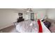 Spacious bedroom features a ceiling fan, TV, and ample natural light at 6481 W Treeline Ln, McCordsville, IN 46055