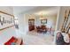 Elegant dining room featuring wood floors, a chandelier, and a classic china cabinet at 6481 W Treeline Ln, McCordsville, IN 46055