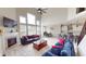 Spacious living room features a fireplace, lots of natural light, and open floor plan with neutral decor at 6481 W Treeline Ln, McCordsville, IN 46055