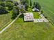 Aerial view of home with surrounding barns and acreage at 695 N 650 W, Lebanon, IN 46052