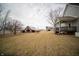 Backyard featuring a detached barn, outbuildings, and a covered porch on the main house at 695 N 650 W, Lebanon, IN 46052