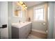 Bright bathroom with a double vanity, modern fixtures, and a large window at 695 N 650 W, Lebanon, IN 46052