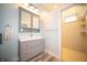 Bathroom featuring a modern vanity, open shower, and neutral color palette at 695 N 650 W, Lebanon, IN 46052