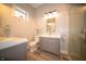 Modern bathroom with dual vanities and updated lighting at 695 N 650 W, Lebanon, IN 46052