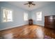 Bedroom with hardwood flooring, windows, and chair at 695 N 650 W, Lebanon, IN 46052