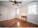 Bright bedroom with a ceiling fan, wood floors, and two windows for ample natural light at 695 N 650 W, Lebanon, IN 46052