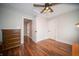 Spacious bedroom featuring wood floors and classic wooden dresser at 695 N 650 W, Lebanon, IN 46052
