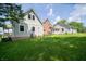 Rear exterior of home with green grass at 695 N 650 W, Lebanon, IN 46052