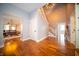 Grand foyer featuring a staircase, hardwood floors, and a high ceiling at 695 N 650 W, Lebanon, IN 46052