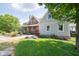Lovely home surrounded by lush landscaping and greenery, featuring a mix of brick and siding at 695 N 650 W, Lebanon, IN 46052