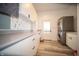 Well-organized laundry room with modern appliances and ample counter space at 695 N 650 W, Lebanon, IN 46052