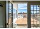 A wood deck with a view of the backyard on a sunny day at 7136 Allegan Dr, Indianapolis, IN 46217