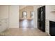 Bright kitchen with an open view into the living area, featuring a black refrigerator at 7136 Allegan Dr, Indianapolis, IN 46217