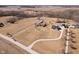 An aerial view captures multiple properties, each with ample land and mature trees at 7260 N 225 W, Lebanon, IN 46052