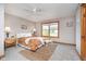 Bedroom featuring a ceiling fan, warm colors, and a rug at 7260 N 225 W, Lebanon, IN 46052
