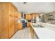 Traditional kitchen featuring wood cabinets, stainless steel appliances, and tile flooring at 7260 N 225 W, Lebanon, IN 46052