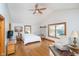 Spacious main bedroom with vaulted ceiling, wood floors and a ceiling fan at 7260 N 225 W, Lebanon, IN 46052