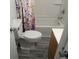 Functional bathroom with a tub and shower combination and neutral finishes at 730 Waldemere Ave, Indianapolis, IN 46241