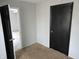 Cozy bedroom with neutral carpet and a large closet, ready for personalization at 730 Waldemere Ave, Indianapolis, IN 46241