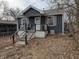 Charming home with a cozy front porch and mature trees in a quiet neighborhood at 730 Waldemere Ave, Indianapolis, IN 46241