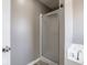 Bathroom featuring walk-in shower and soaking tub with tile floors at 7536 Shasta Dr, Indianapolis, IN 46217
