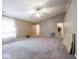 Spacious main bedroom featuring vaulted ceilings and neutral carpeting at 7536 Shasta Dr, Indianapolis, IN 46217