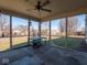 Inviting screened porch with ample space, perfect for enjoying the outdoors in comfort and style at 7536 Shasta Dr, Indianapolis, IN 46217