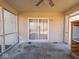 Cozy screened porch with a sliding glass door, seamlessly blending indoor and outdoor living spaces at 7536 Shasta Dr, Indianapolis, IN 46217