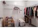 Walk-in closet with wire shelving and carpet flooring at 7536 Shasta Dr, Indianapolis, IN 46217